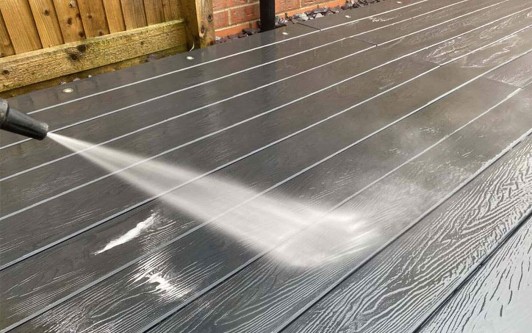 Can I power wash composite decking boards?